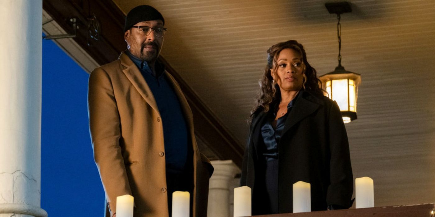 Jesse L. Martin as Alec Mercer standing next to Maahra Hill as Marisa Clark in Season 2 of The Irrational