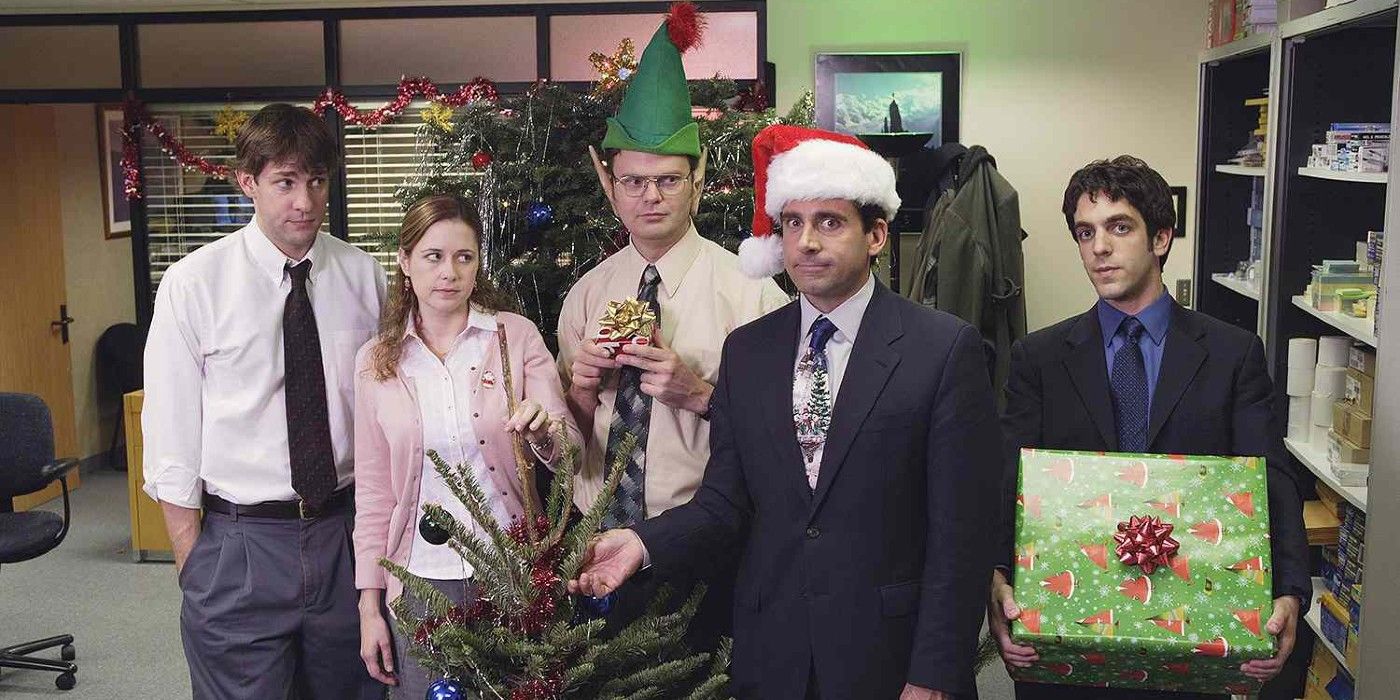 The cast of 'The Office' with a little tree in "The Christmas Party"