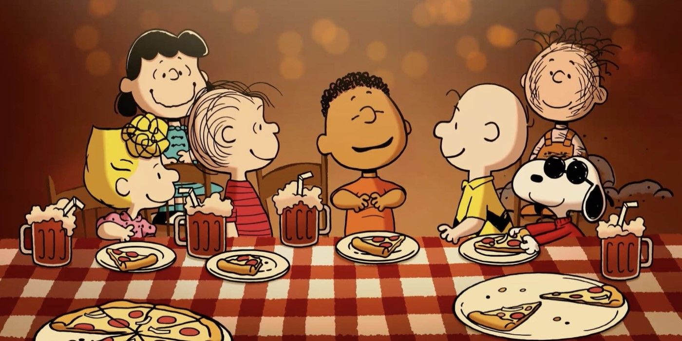 The Peanuts gang at the table, listening to Franklin (Caleb Bellavance) speaking in &lsquo;Welcome Home, Franklin&rsquo;