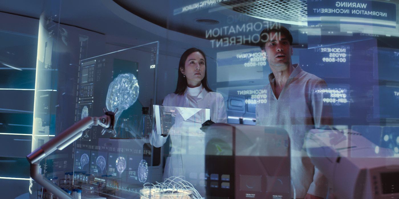 Two people looking at a display screen in Tomorrow and I Episode 2