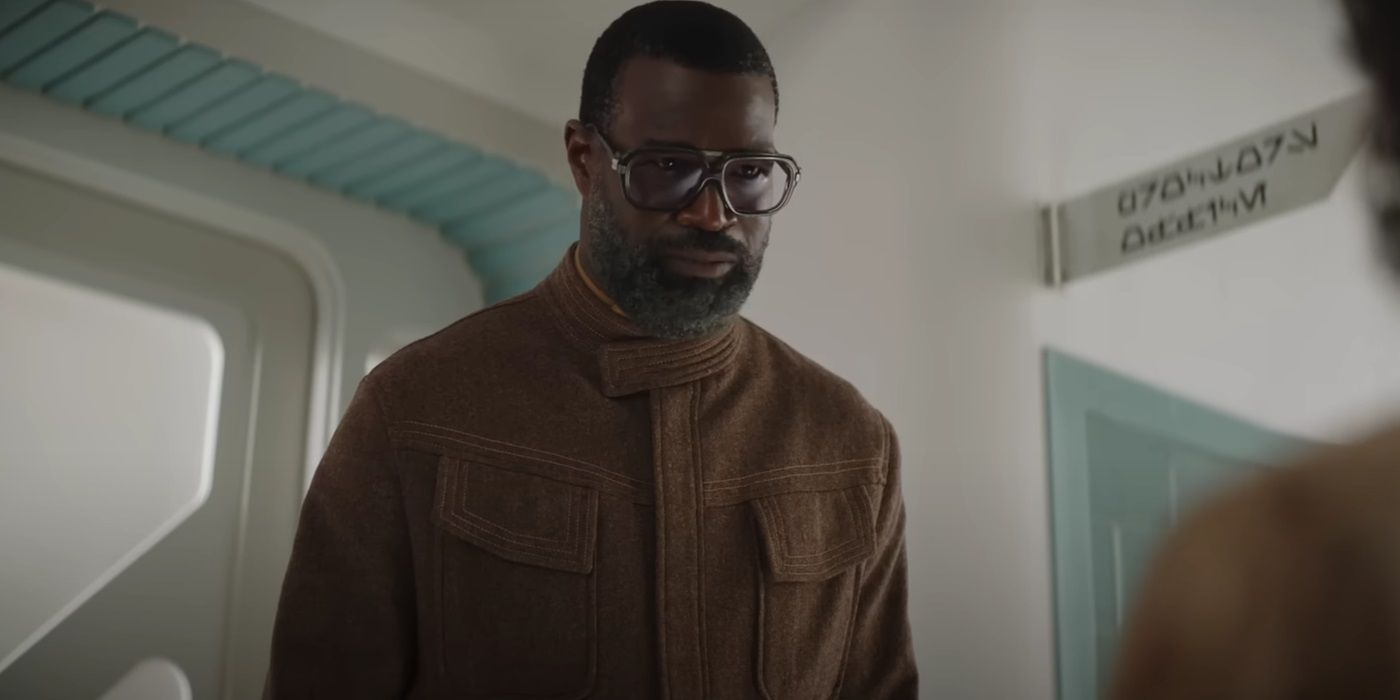 Tunde Adebimpe, frowning at his son, as Wendle in Star Wars: Skeleton Crew