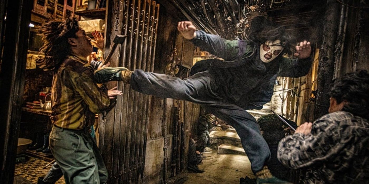 Masked man kicking in Twilight of the Warriors: Walled In