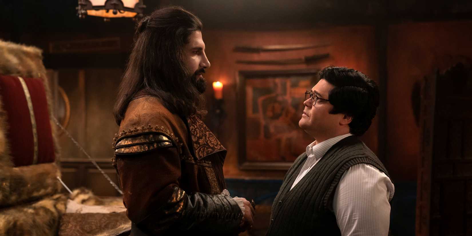 Harvey Guillén as Guillermo facing and talking to Kayvan Novak as Nandor in What We Do in the Shadows Season 6