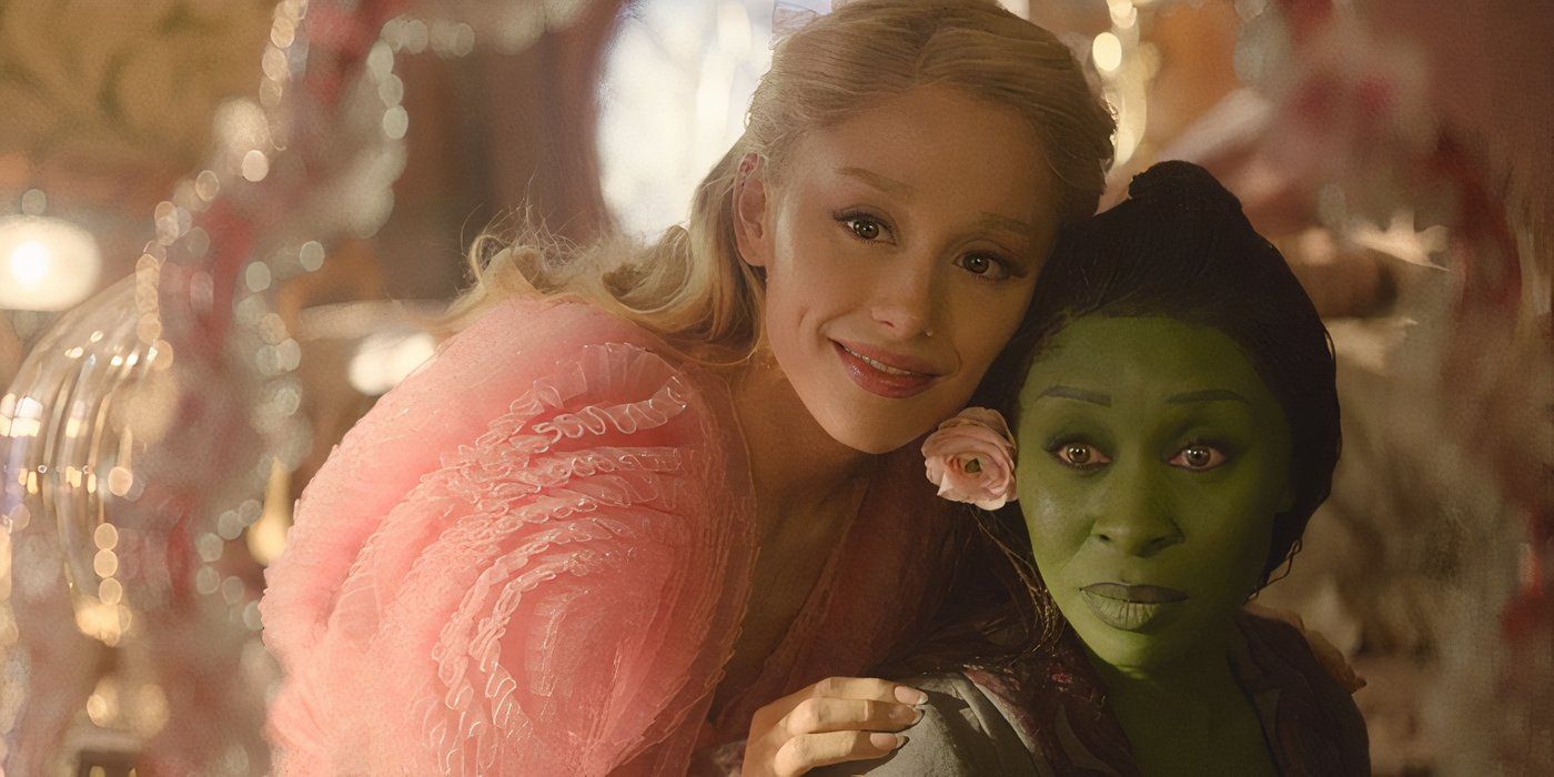 Glinda smiling at Elphaba in a mirror in Wicked Part 1.