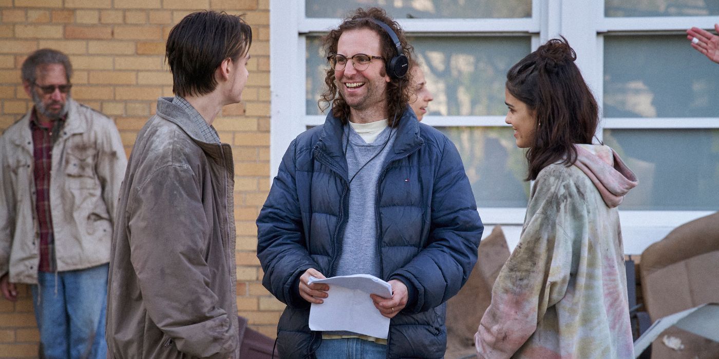 Jaeden Martell, Kyle Mooney, and Rachel Zegler on the set of Y2K.