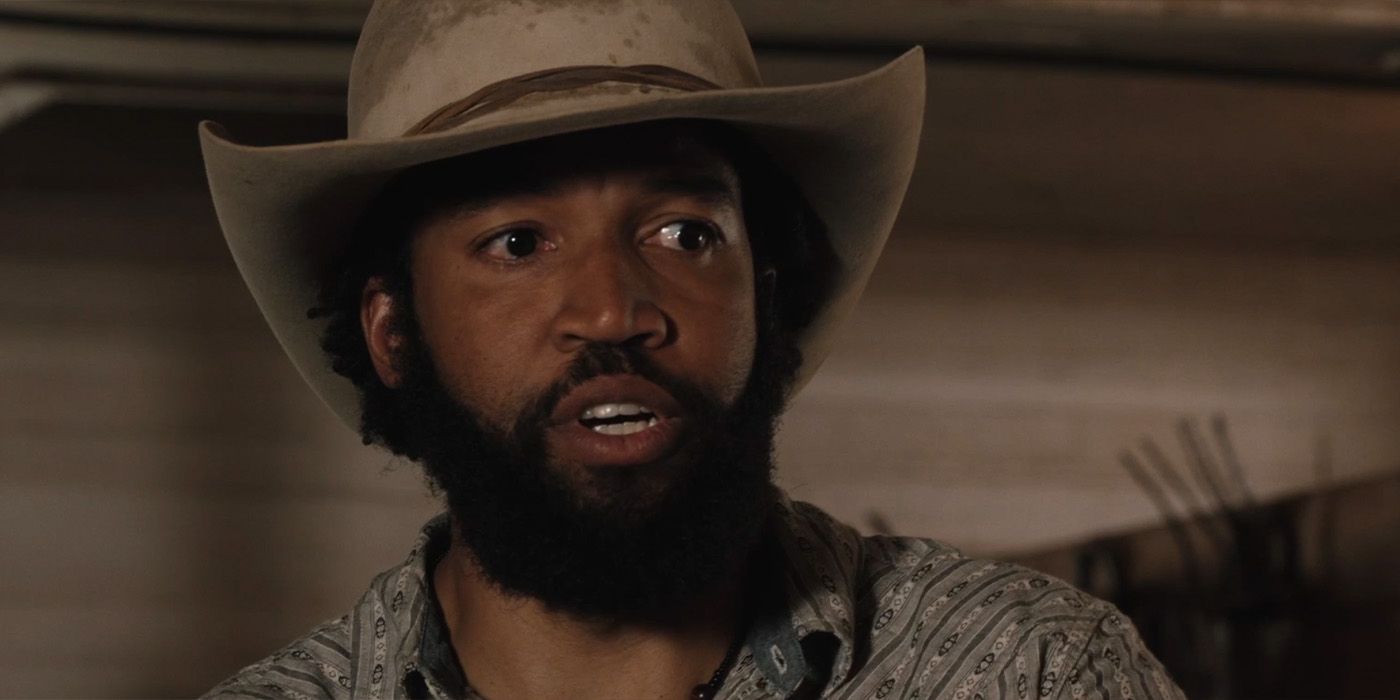 Colby (Denim Richards) standing in the barn in Yellowstone Season 5 Episode 12