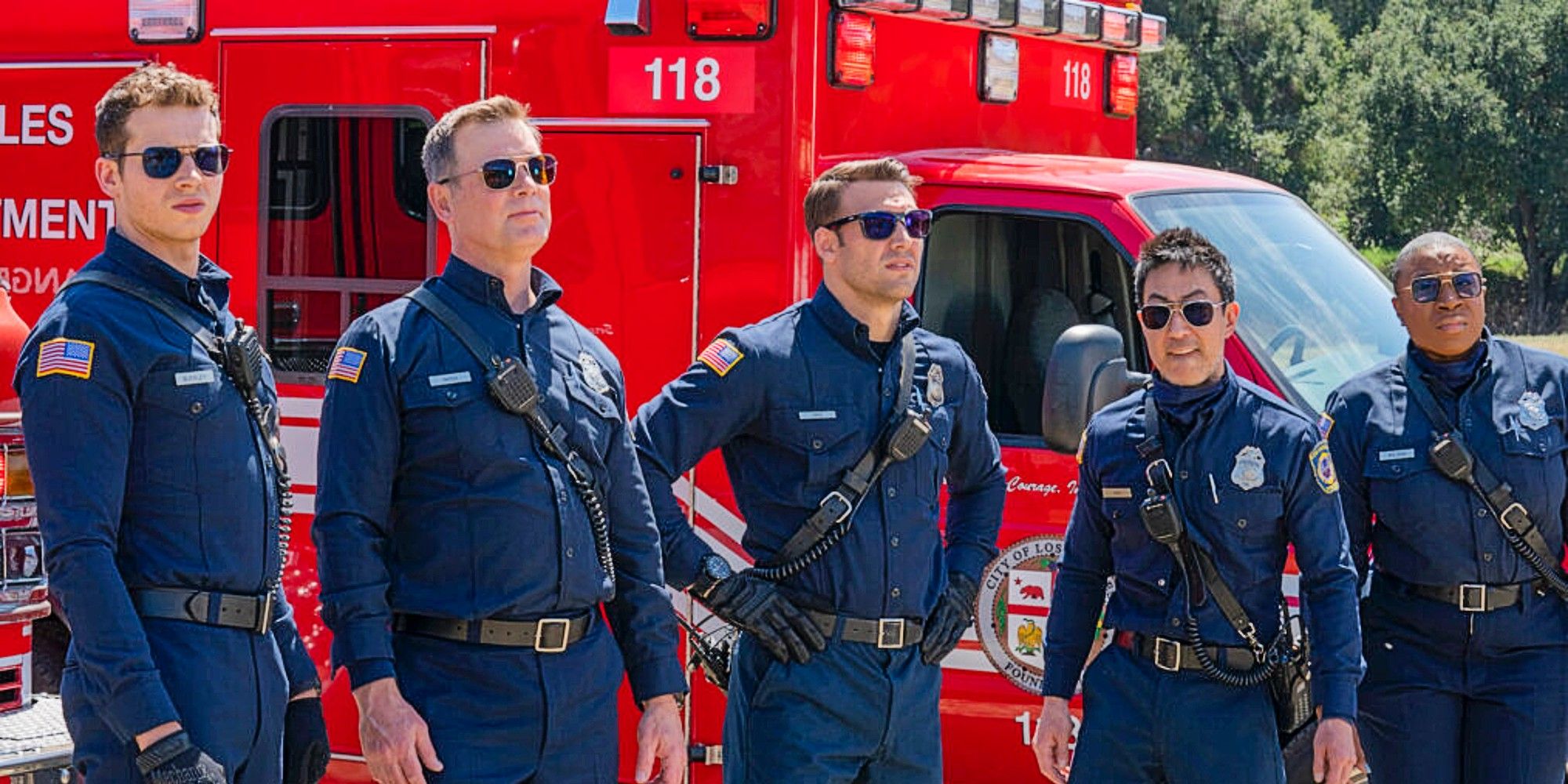 Buck, Bobby, Eddie, Chimney, and Hen standing in front of a firetruck in 9-1-1 Season 8