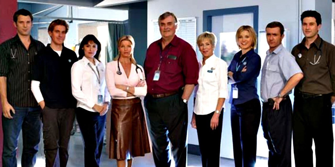 The cast of All Saints standing in a row