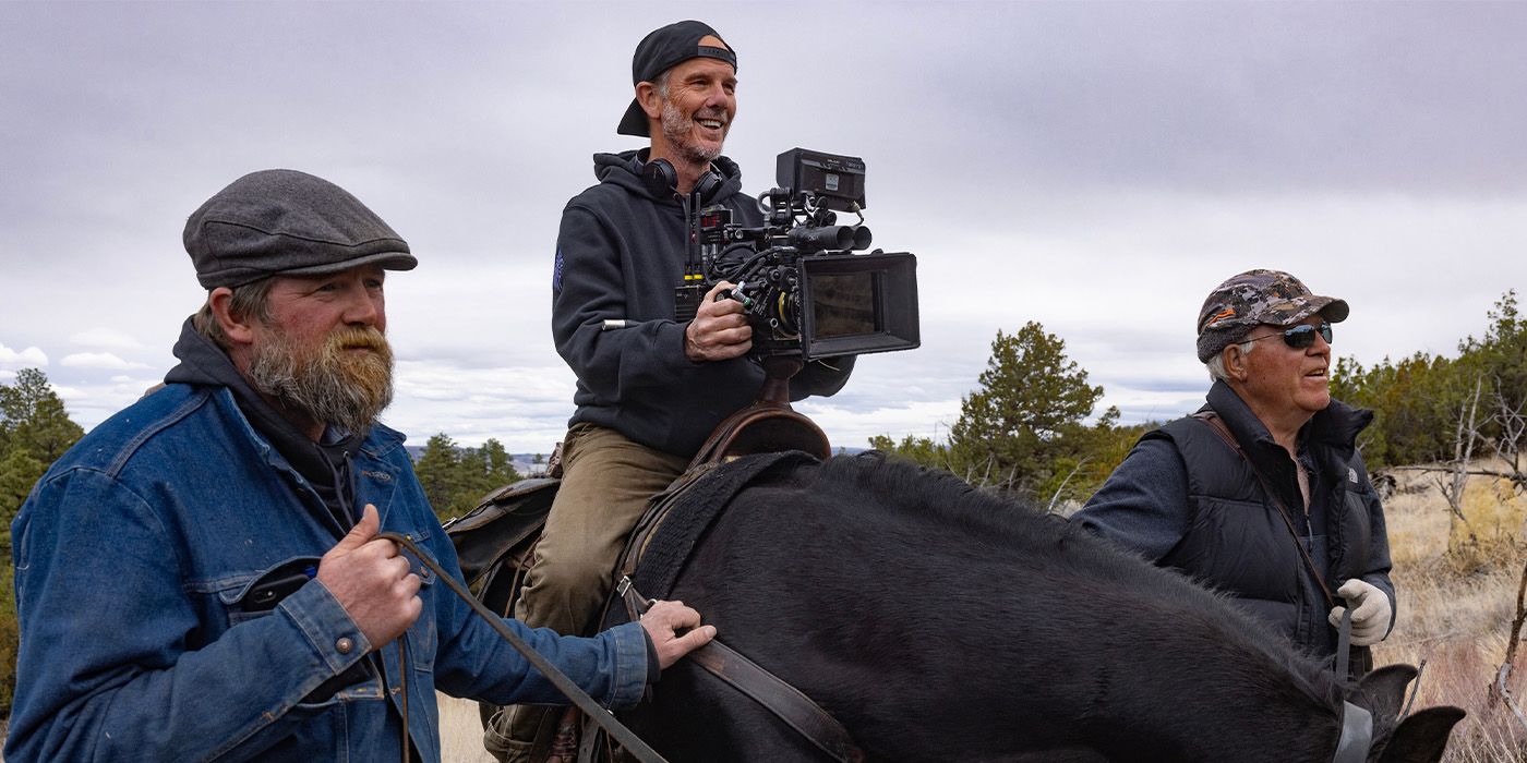 Director Pete Berg films on the set of American Primeval on horseback