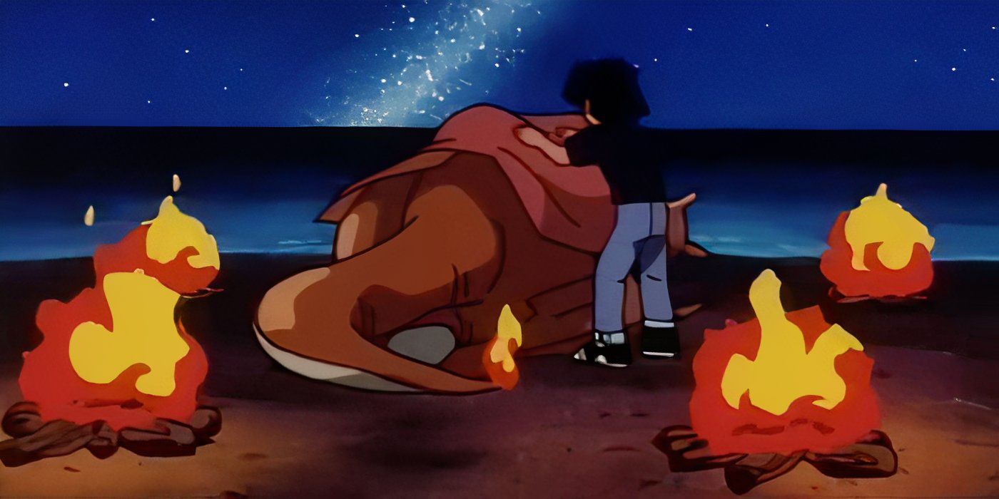 Ash covering Charizard with a blanket in Pokémon