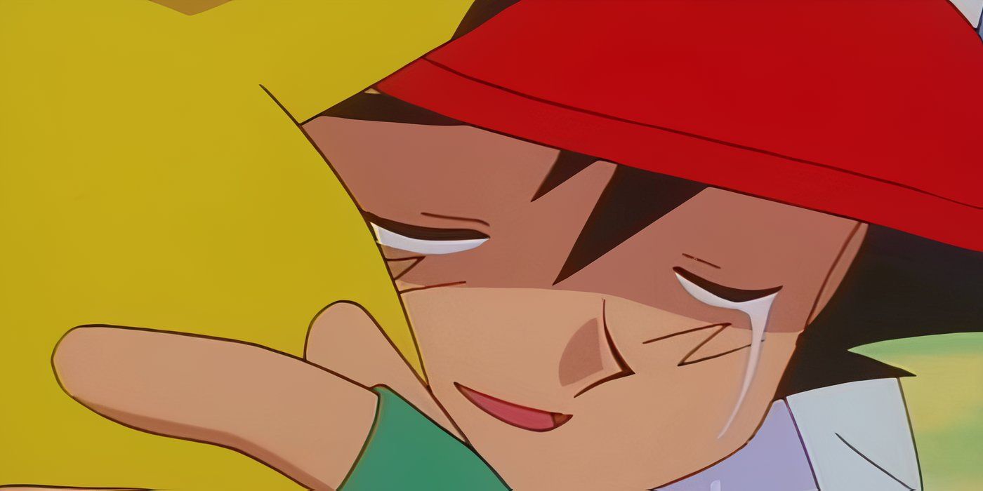 Ash crying as he hugs Pikachu in Pokémon