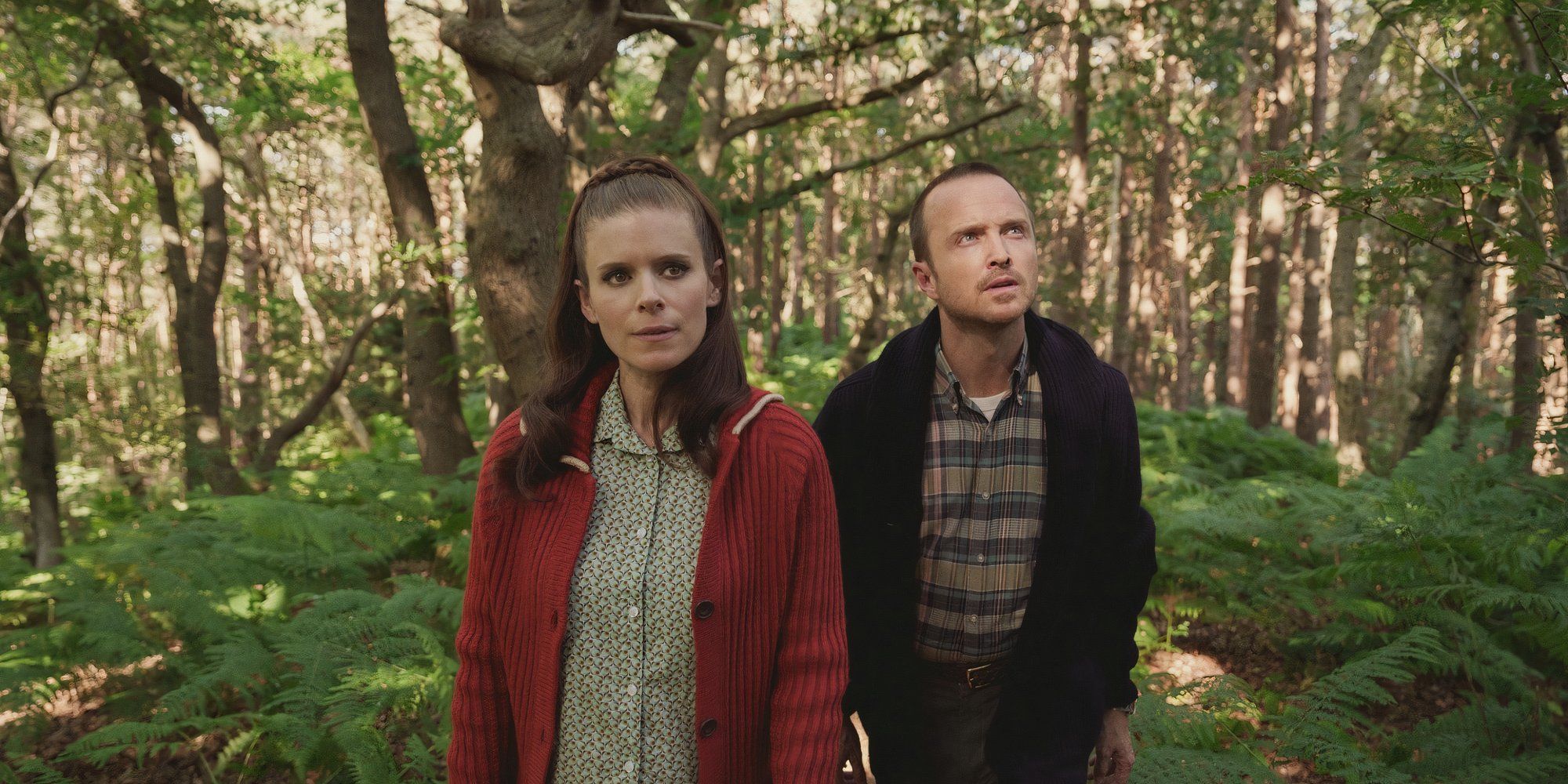 Cliff and Mara walk together on the acreage of their farmland in Black Mirror Episode &ldquo;Beyond the Sea.&quot;