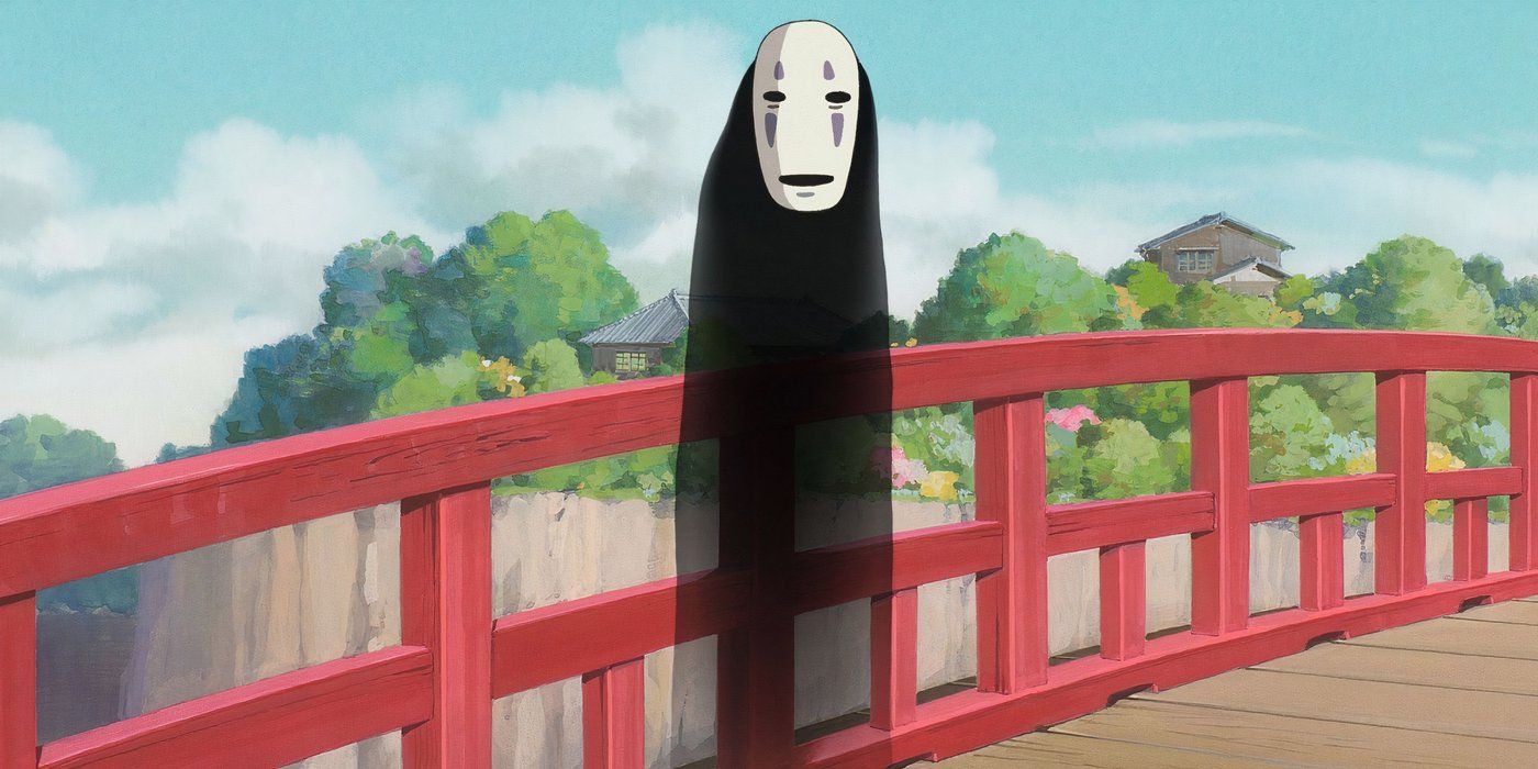 No-Face stands on a bridge in Spirited Away. 