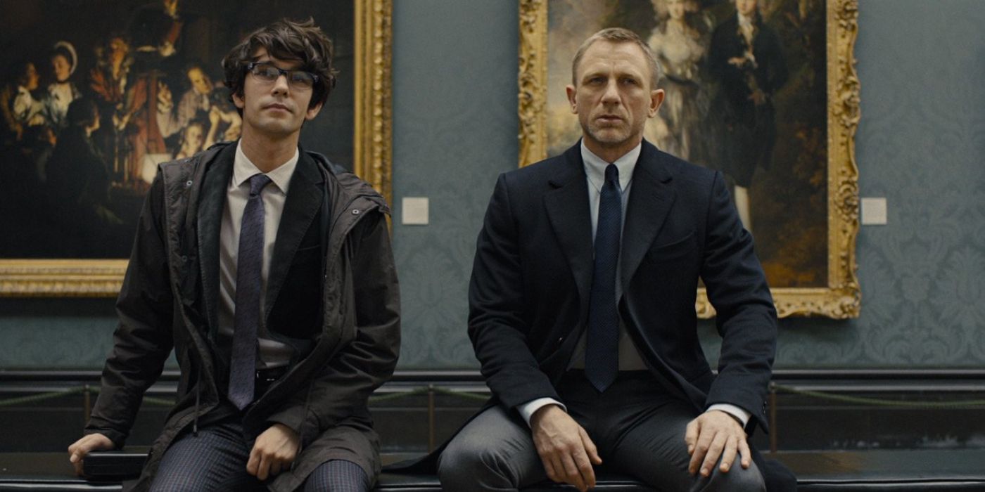 Ben Whishaw and Daniel Craig sitting at the National Gallery next to each other and talking about something they're looking at in front of them