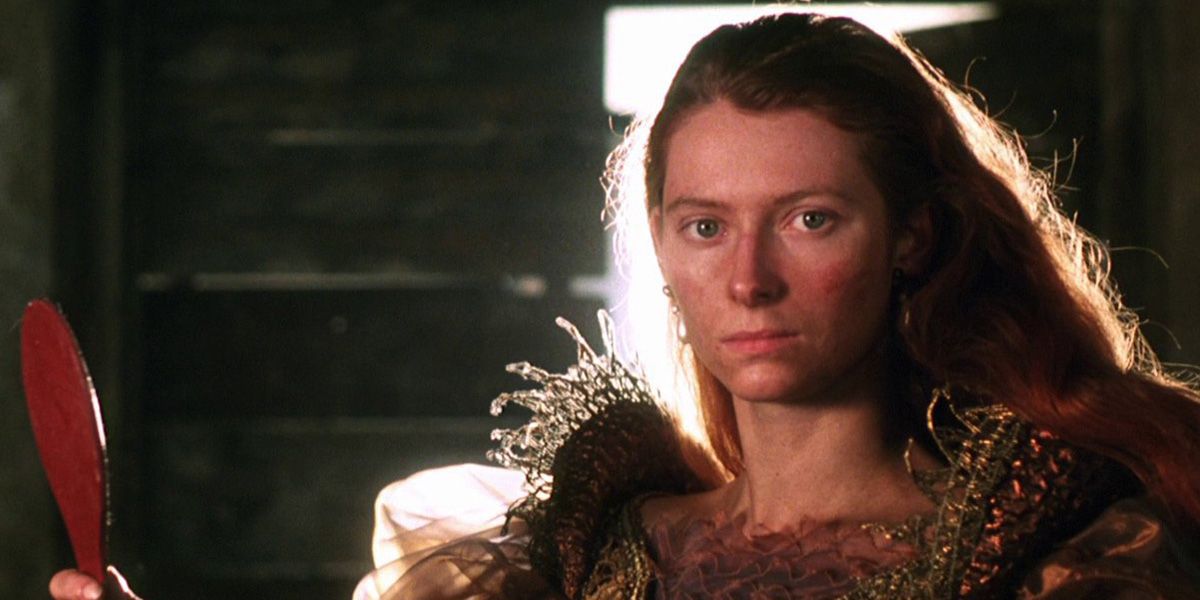 Tilda Swinton holds a mirror in Caravaggio