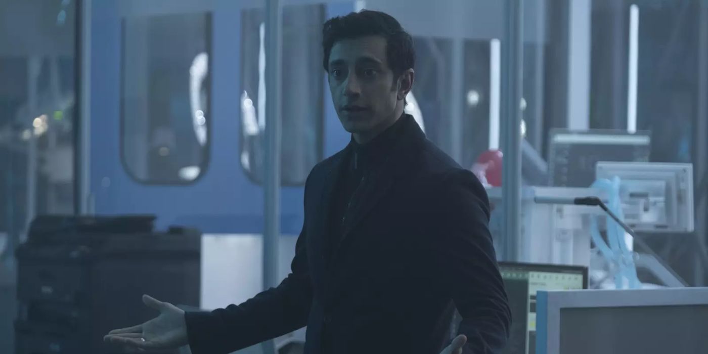 Riz Ahmed as Carlton Drake talking in a lab in Venom.