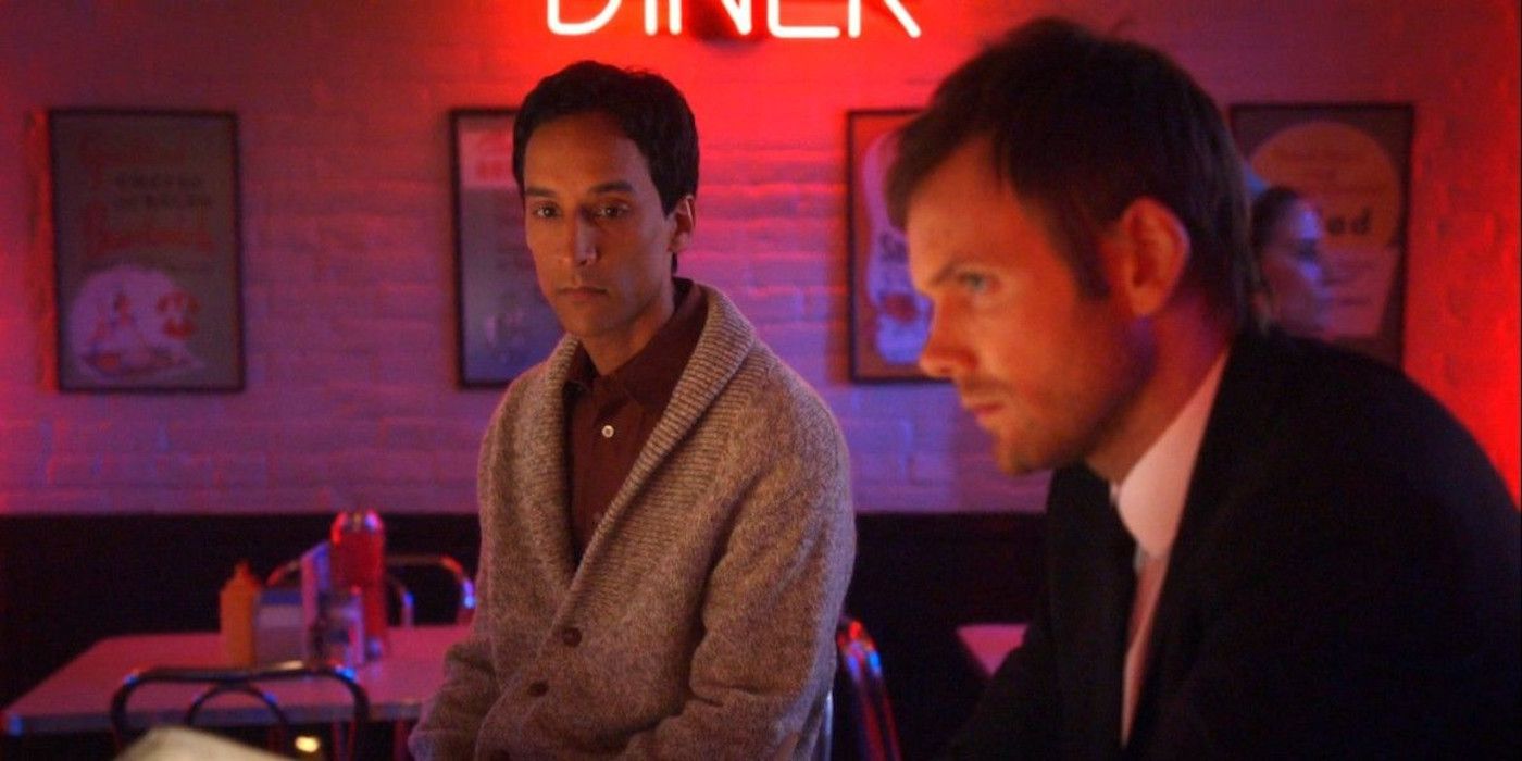 Abed and Jeff sit at a diner counter together in Community