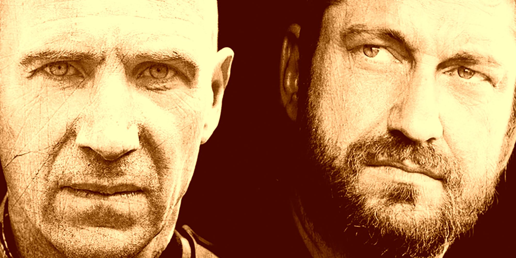 Coriolanus, played by actor Ralph Fiennes, stands beside Tullus Aufidius, played by actor Gerard Butler.