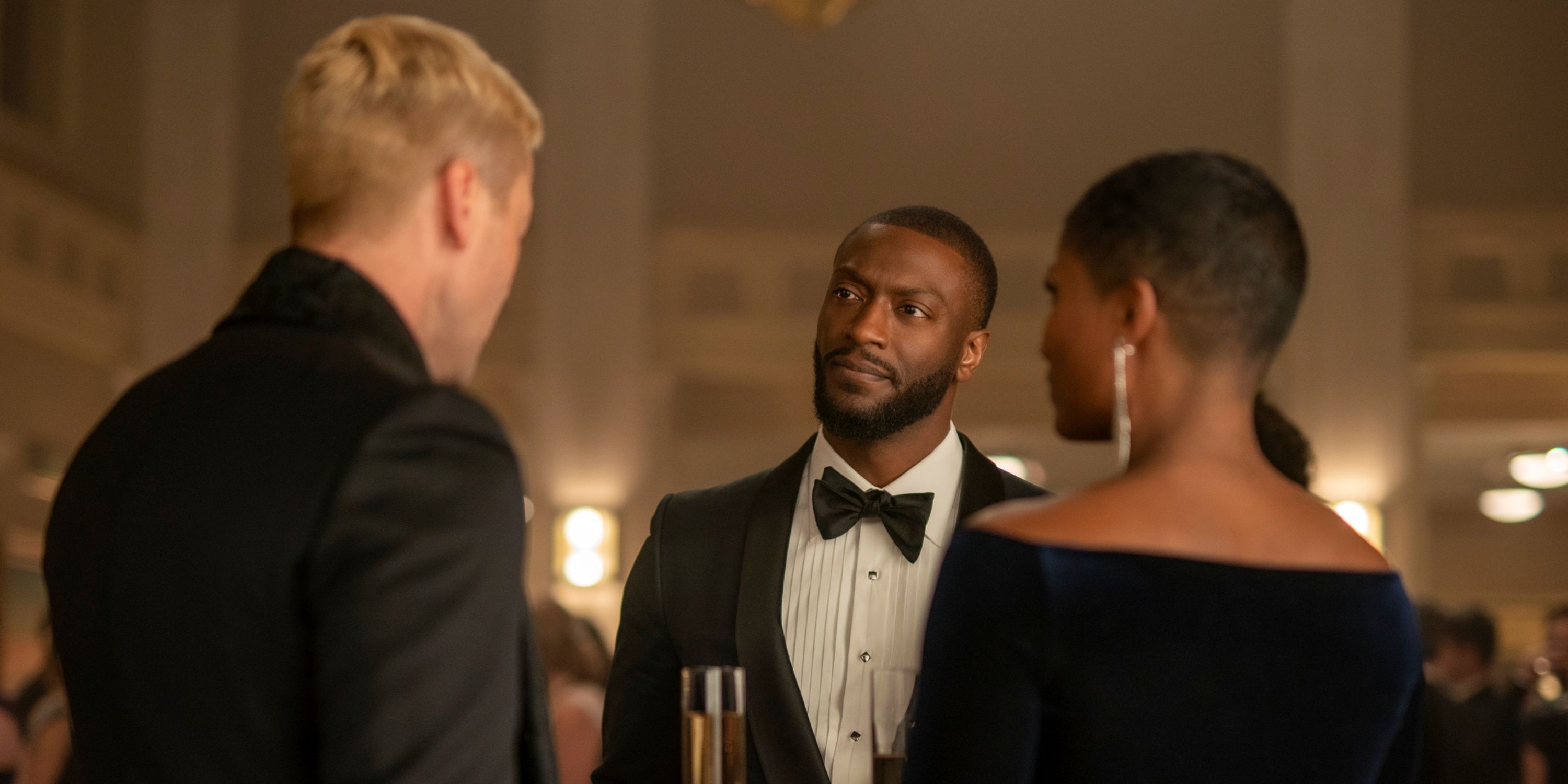 Ryan Eggold as Ed Ramsey with Aldis Hodge as Alex Cross in a tuxedo in Cross