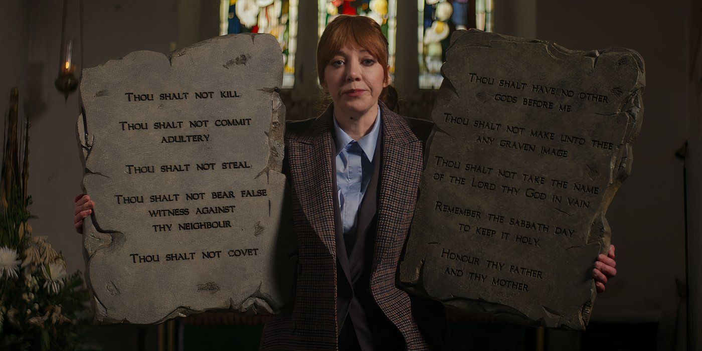 Philomena Cunk (Diane Morgan) holds up two large stones inscribed with the Ten Commandments in 'Cunk on Life'.