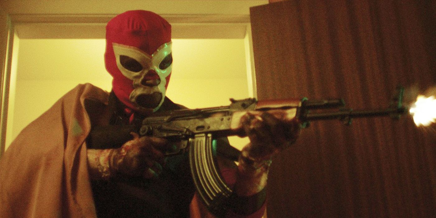 Enigma Jones firing a gun in Dark Match