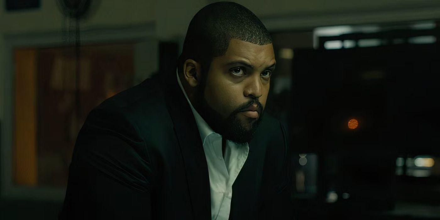 O'Shea Jackson Jr. wears a suit and looks serious in Den of Thieves.