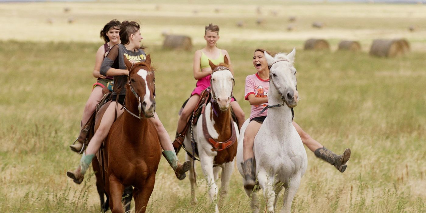 Porschia Zimiga, Brynn Darling, Leanna Shumpert and Chancey Ryder on horseback in a field in East of Wall