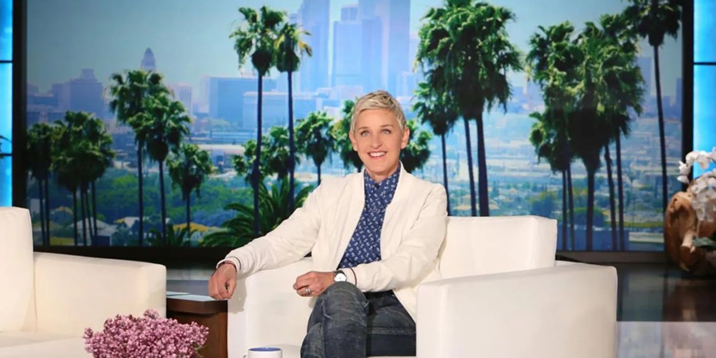 Host Ellen DeGeneres sits in a chair on the set of The Ellen DeGeneres Show.