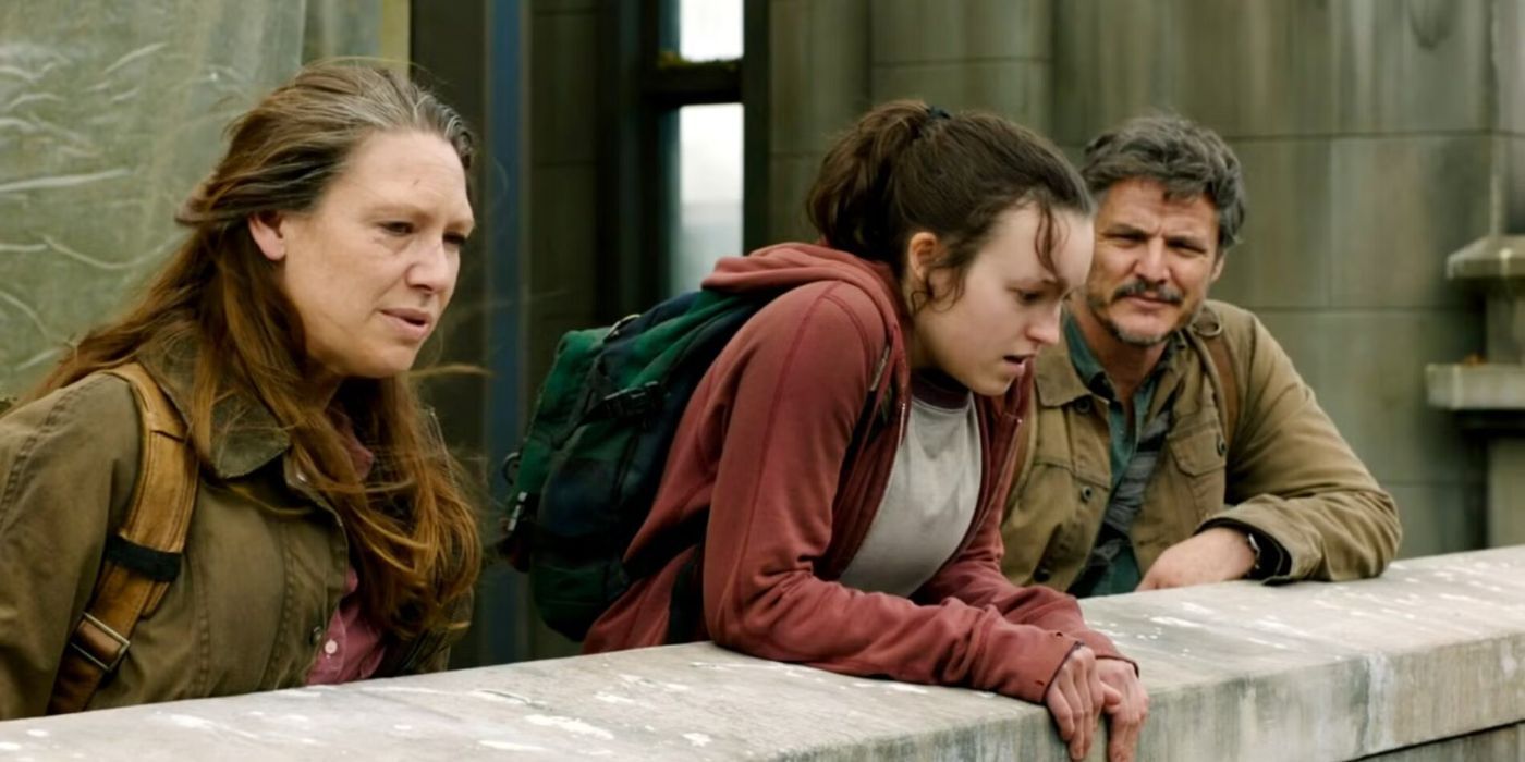 Ellie, Tess, and Joel standing on the roof of a hotel in The Last of Us.