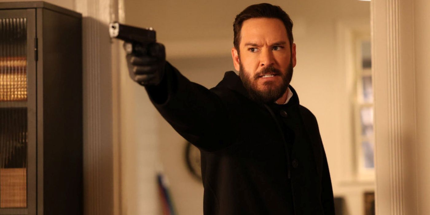 Mark-Paul Gosselaar as Sir holding out a gun with his right arm and hand in Season 2 of Found