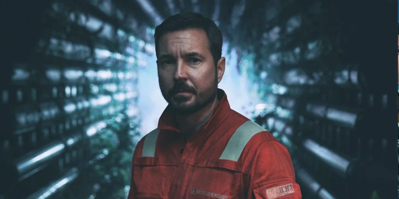 Fulmer (Martin Compston) standing in a passageway in &lsquo;The Rig&rsquo;