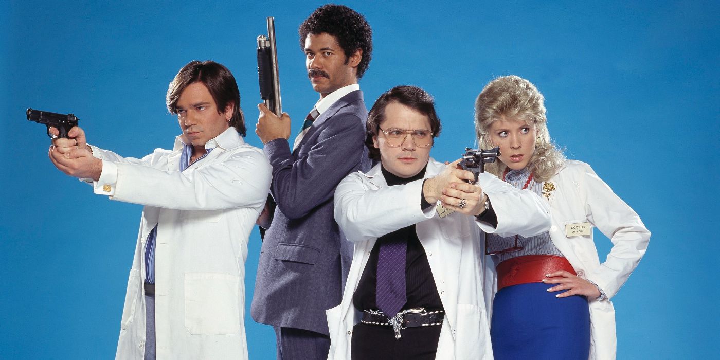 Matthew Holness, Richard Ayoade, Matt Berry, and Alice Lowe posing for Garth Marenghi's Darkplace