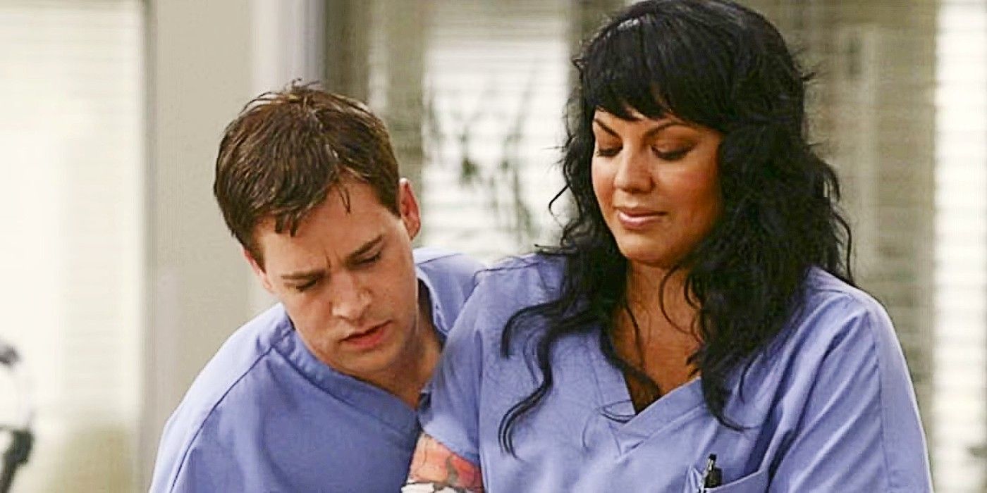 George looking over Callie&rsquo;s shoulder in Grey&rsquo;s Anatomy Season 1.
