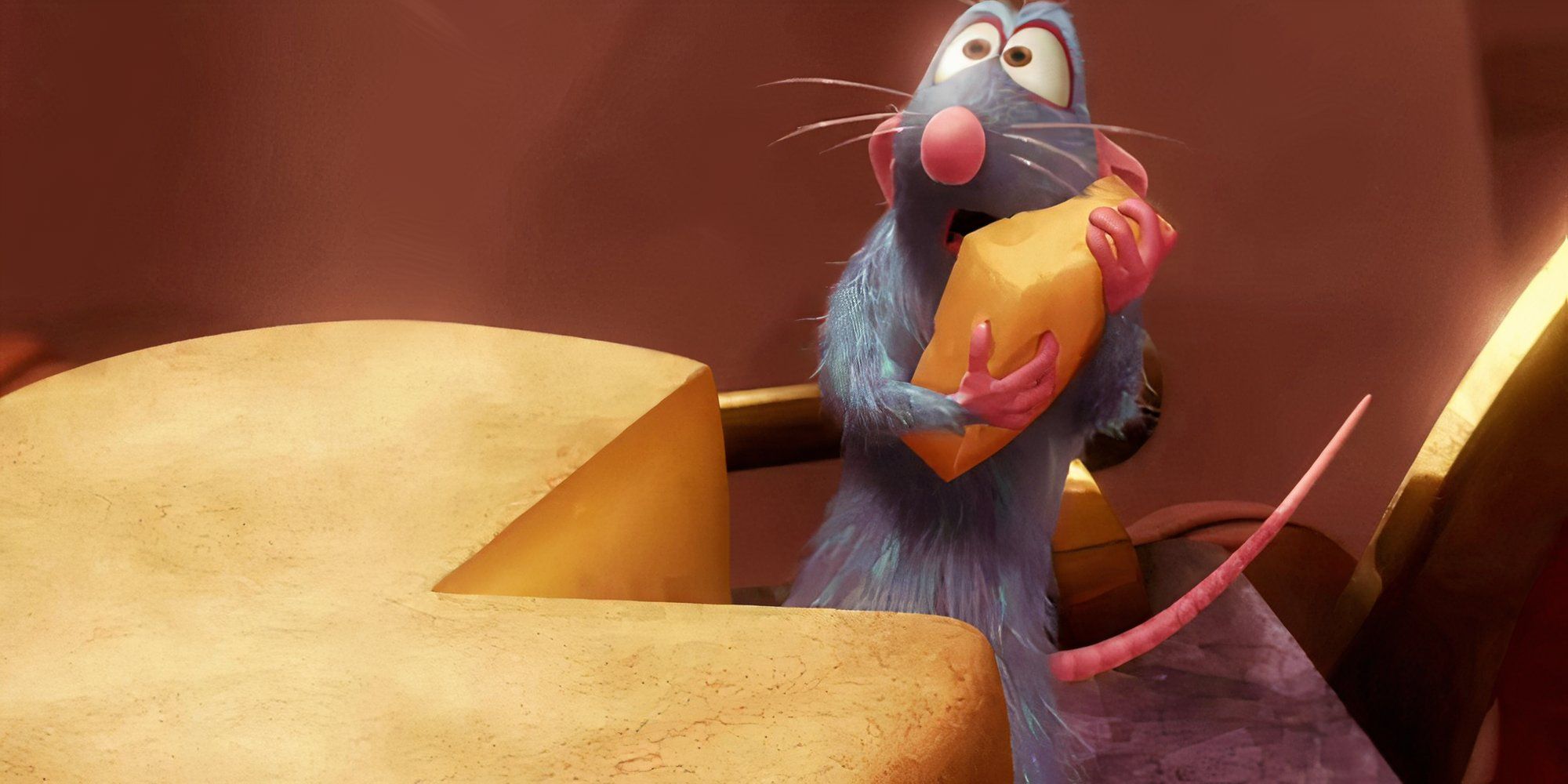 Remy holding a piece of cheese looking shocked in Rataouille.