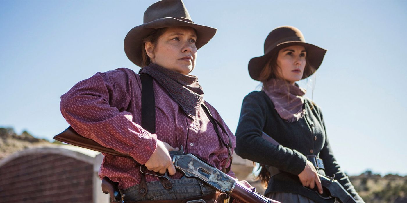 Mary Agnes (Merritt Wever) and Alice Fletcher (Michelle Dockery) holding rifles in Godless