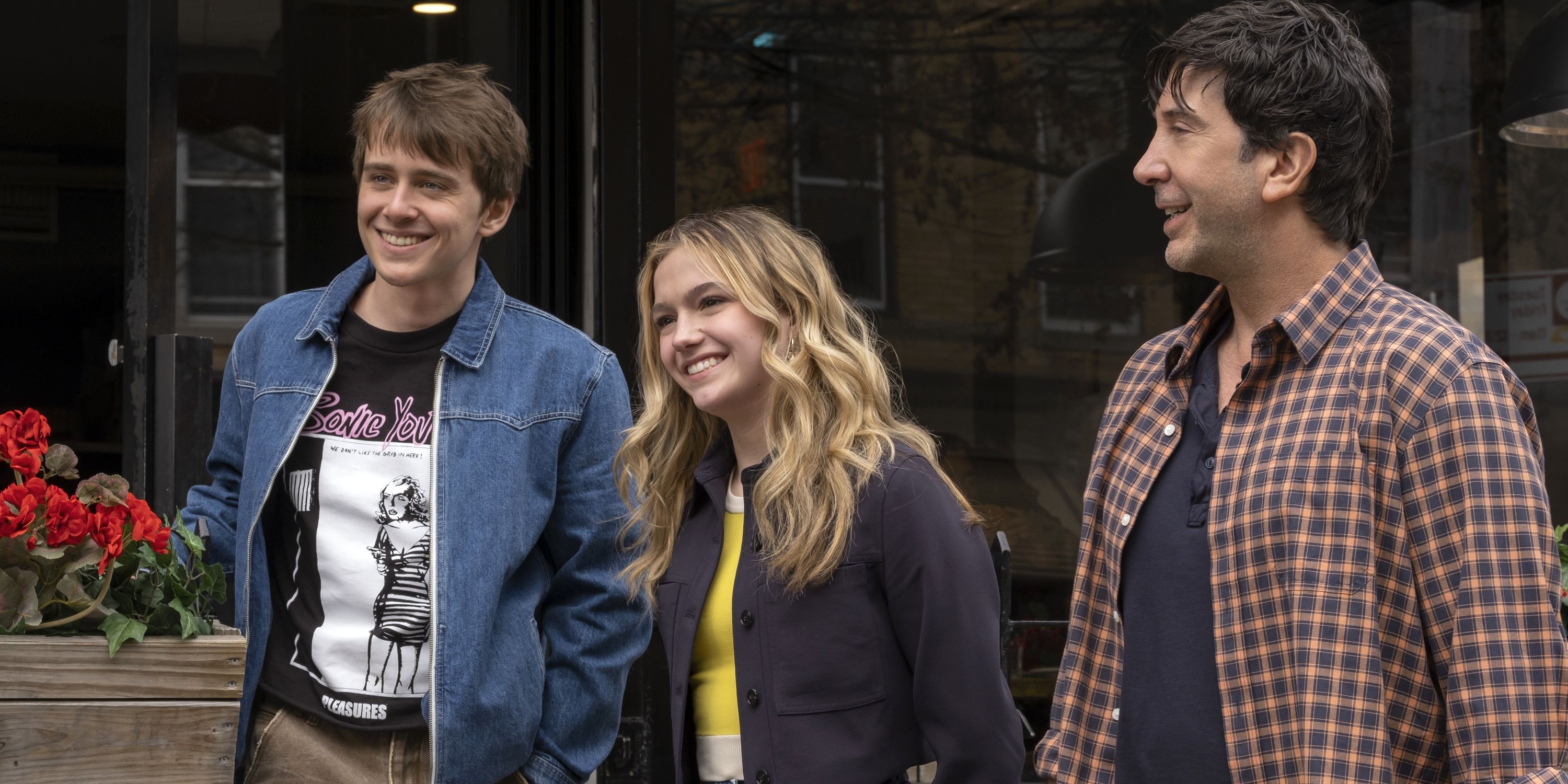 David Schwimmer walking outside with Jayden Bartels and Sam McCarthy in Goosebumps: The Vanishing
