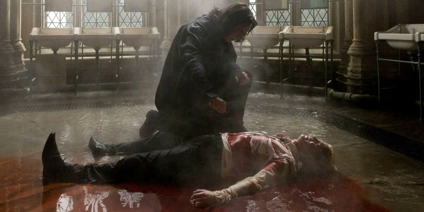 Snape inspects Draco's wounds after Harry used Sectumsempra in Harry Potter and the Half-Blood Prince.