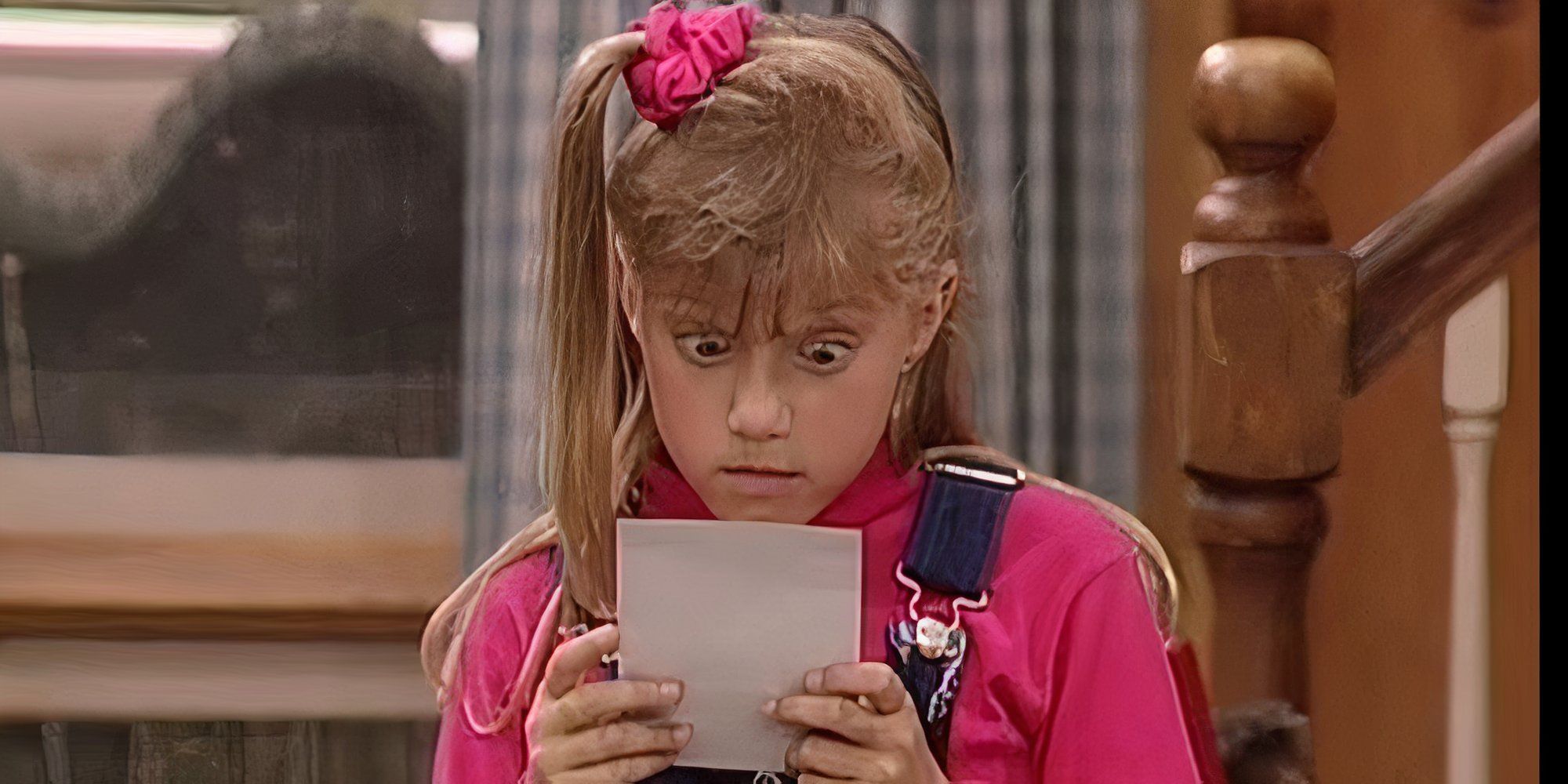 Stephanie is reading letter and appears shocked!