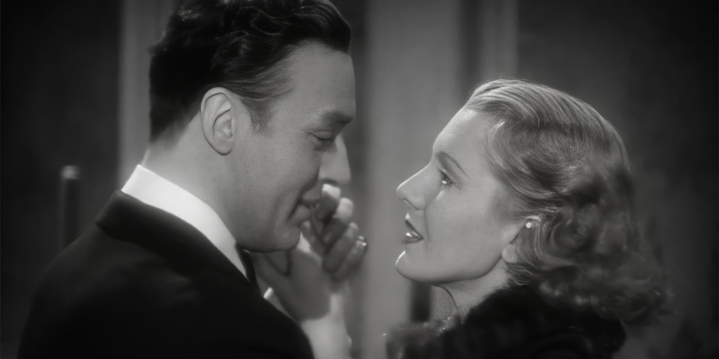 Paul (Charles Boyer) and Irene (Jean Arthur) looking at each other in History Is Made At Night