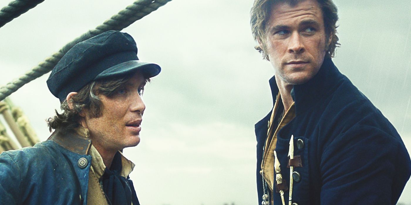 Cillian Murphy's Matthew standing with Chris Hemsworth's Owen in In the Heart of the Sea