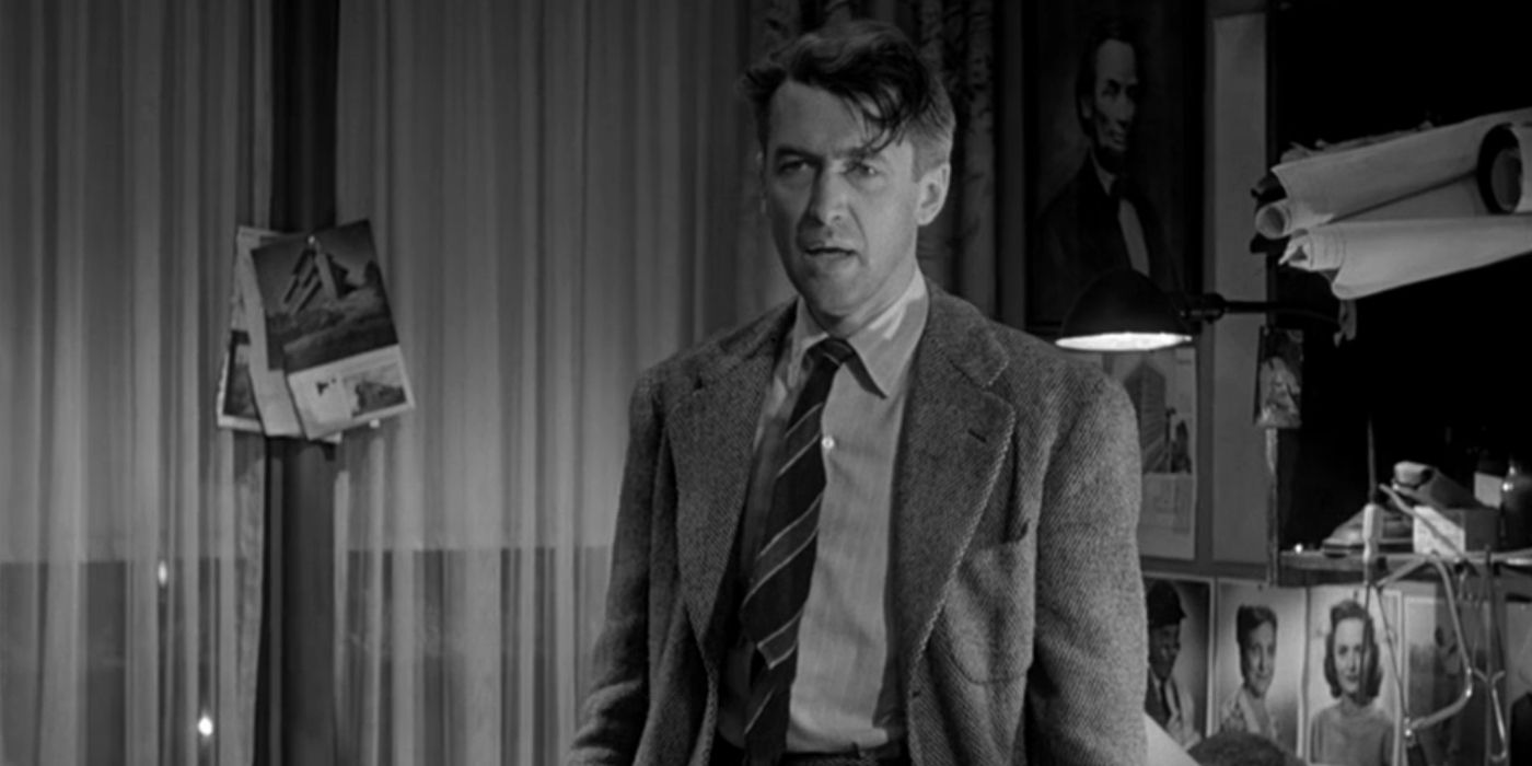 George Bailey, played by James Stewart, stands with his hair unkempt in 'It's a Wonderful Life'.