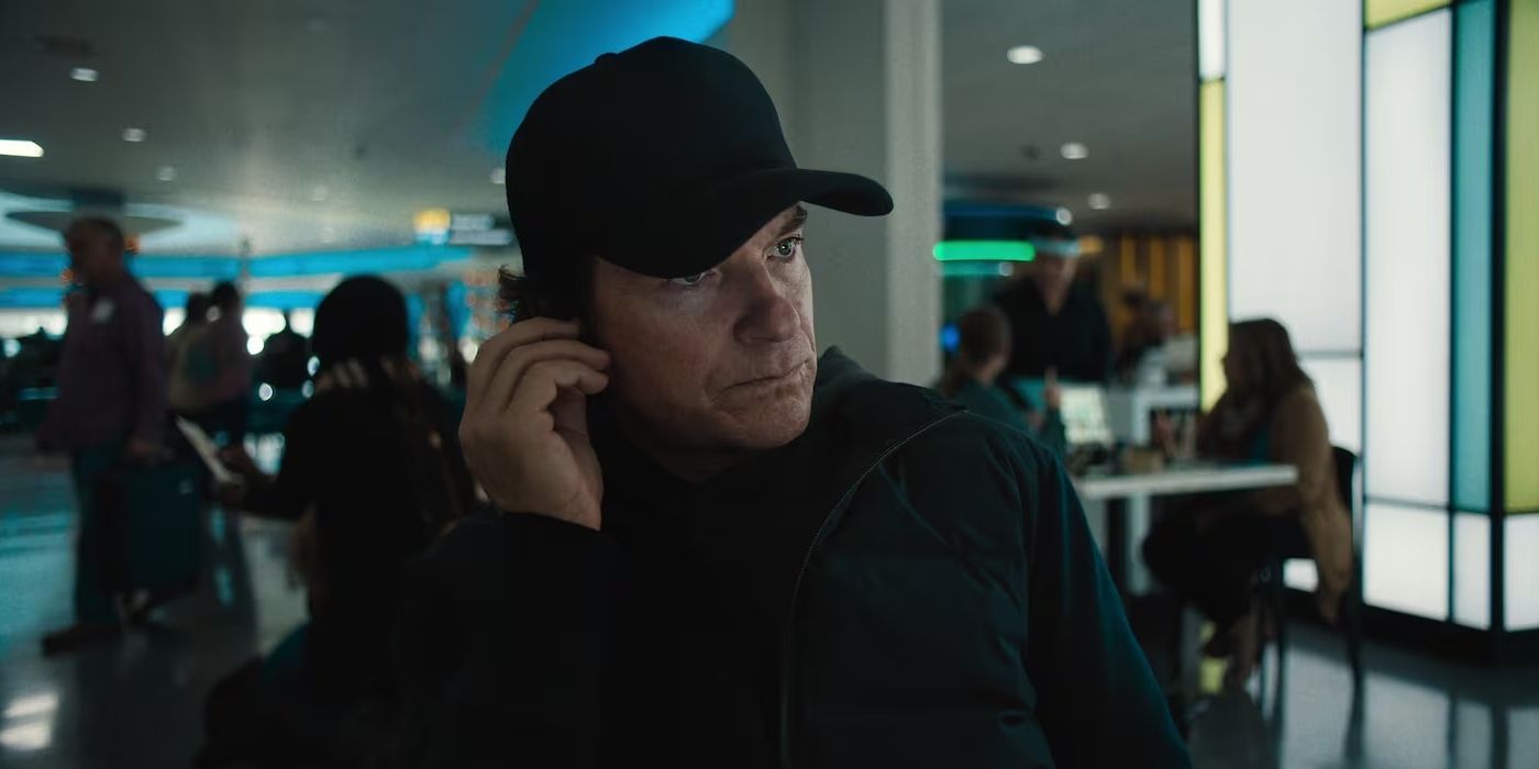 Jason Bateman on the phone as the Traveler in Carry-On