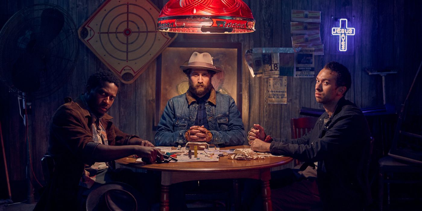 jason-fobart-the-devil-and-the-daylong-brother-trio-sitting-at-a-table