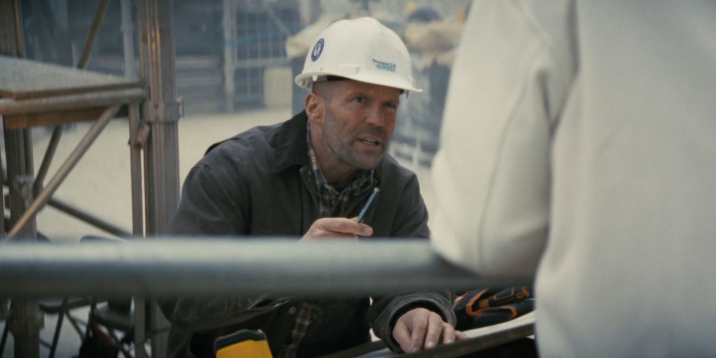 Jason Statham as Levon Cade wearing a white hardhat in A Working Man.