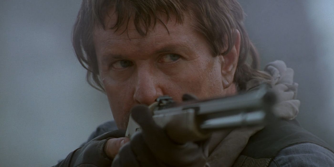 Cain Hammett (Tom Berenger) holds up his rifle in 'Johnson County War'