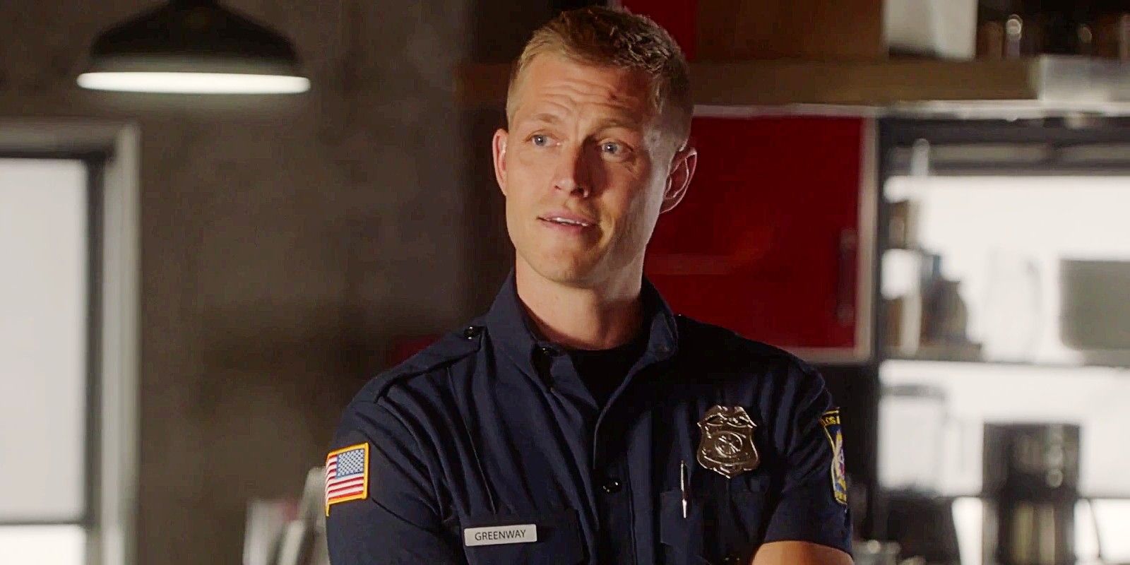 Jonah Greenway standing in the 118 firehouse in 9-1-1 Season 5.