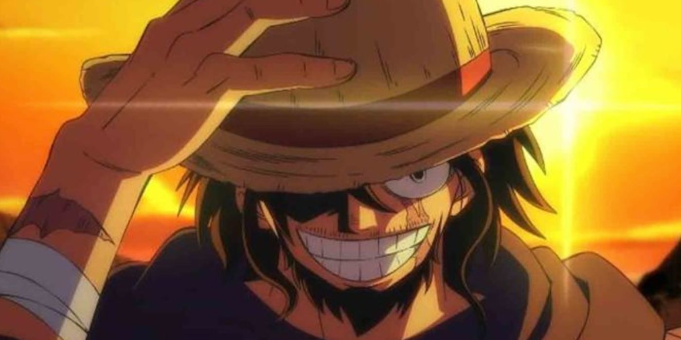 The character Joy Boy tips his straw hat and smiles a creepy smile with a sunset behind him in One Piece.