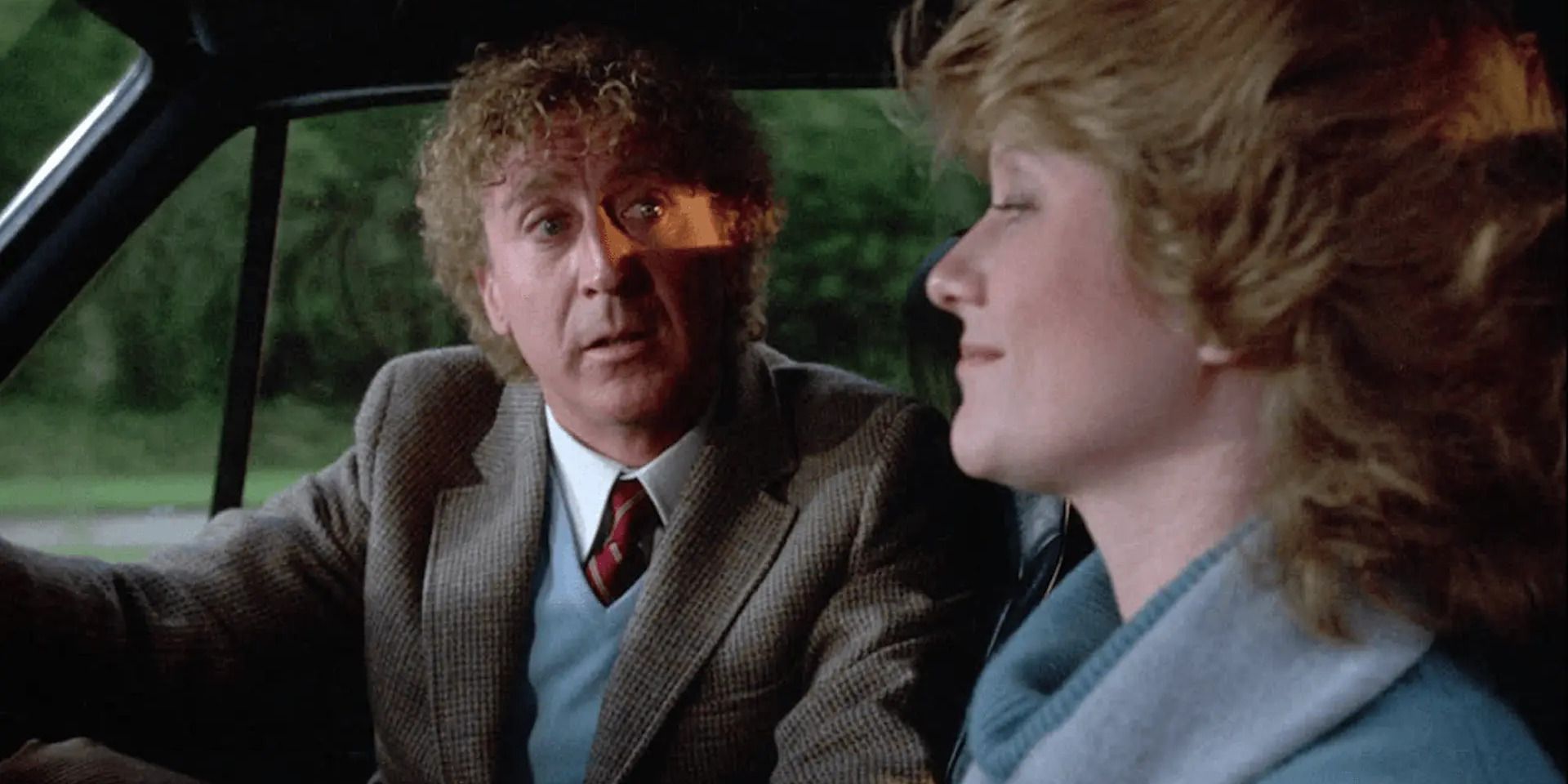 Judith Ivey and Gene Wilder in 'The Woman in Red' in a car