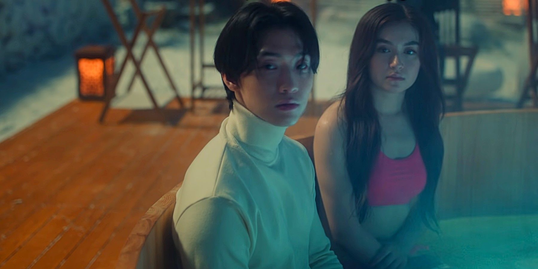Min Ho and Kitty sitting in the hot tub together in Season 2 of XO, Kitty