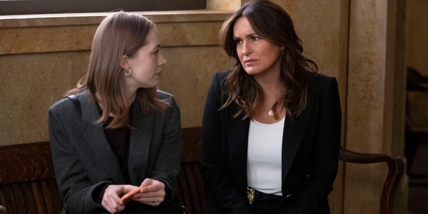 Olivia Benson sits next to and looks at a young lady outside a courtroom in Law and Order SVU.
